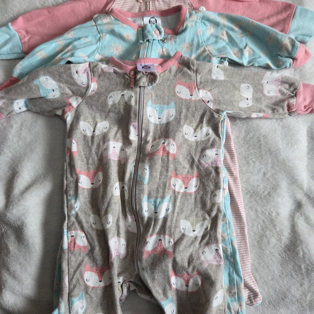 Gerber Baby Onesies in Pink, Blue, and Gray